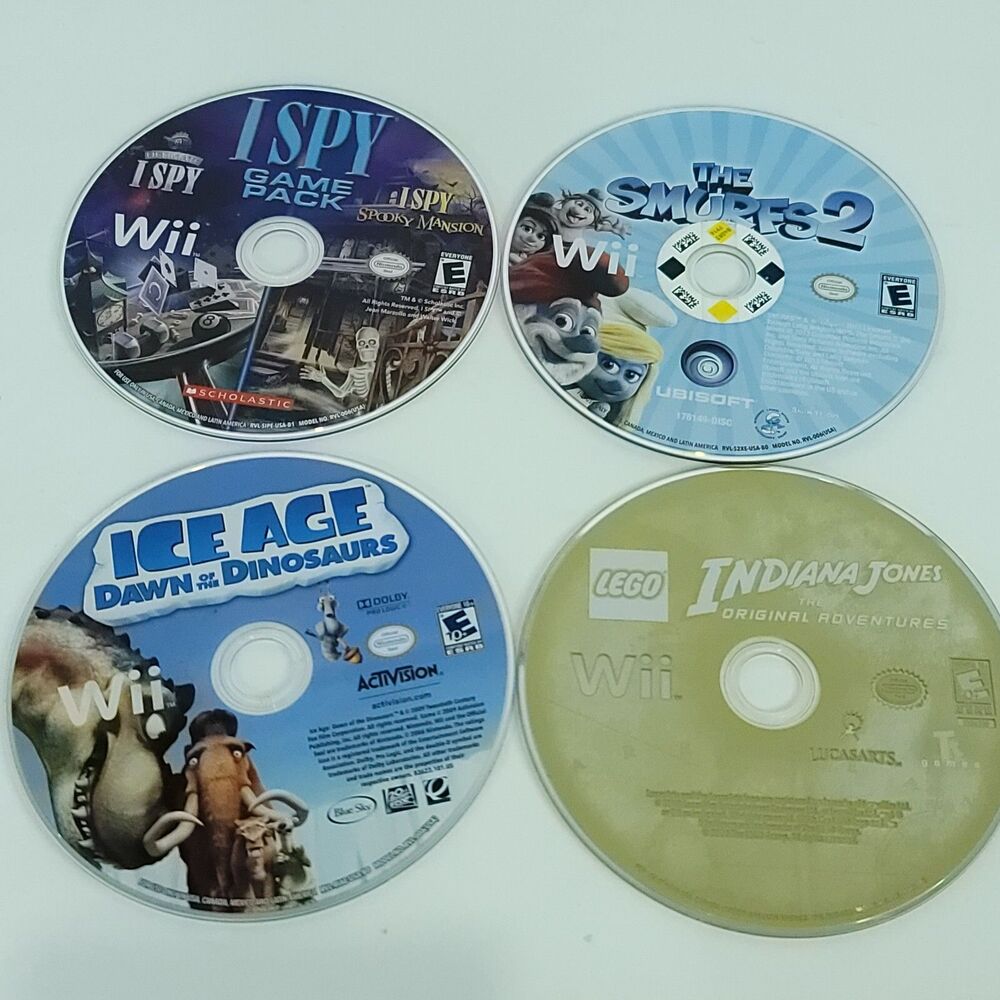 Nintendo Wii Games Lot of 4 Bundle Indiana Jones I Spy Smurfs 2 Ice Age Dawn